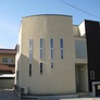 京都府宇治市・Ｒ壁の外壁、パティオのあるモダン住宅 