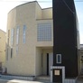 京都府宇治市・Ｒ壁の外壁、パティオのあるモダン住宅